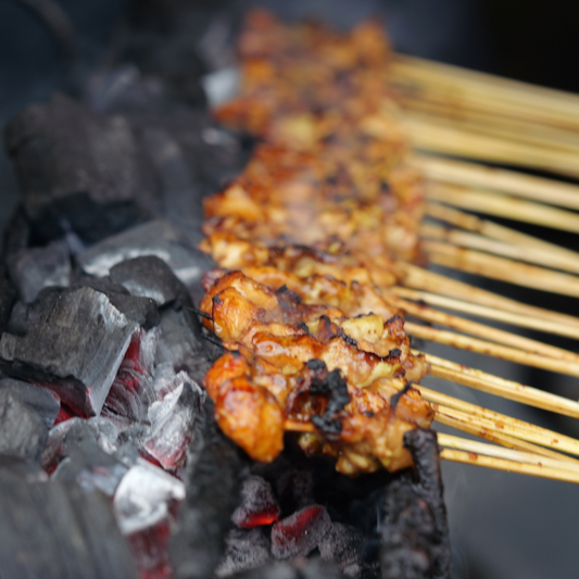 Satay chicken skewers with Indonesian pickle